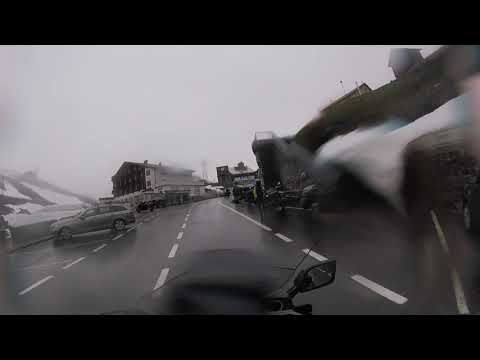Riding Stelvio Pass (70 hairpin bends, 9000+ ft) at -4C and Rain
