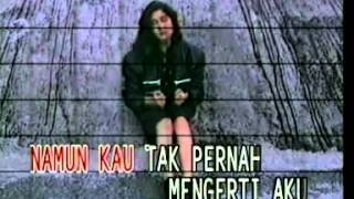 Download lagu nike ardilla - nyalakan api - house music mp3