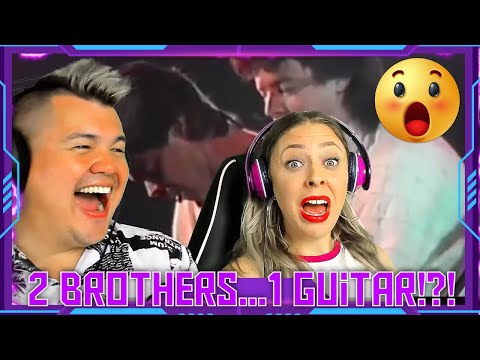 Reaction to "Tommy Emmanuel and Phil - Sultans of Swing (LIVE 1986)" THE WOLF HUNTERZ Jon and Dolly