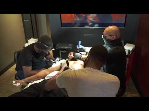 DaHoodRockstar Gets Tatted By multiple Artist At Once