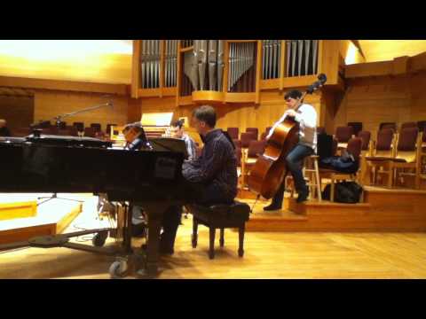 Jazz trio improvising in Calvin College chapel before a Symposium 2014 worship service