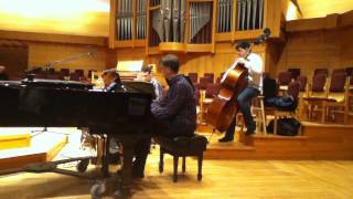 Jazz trio improvising in Calvin College chapel before a Symposium 2014 worship service
