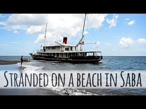 Stranded on a beach in Saba— Sailing Uma [Step 83]