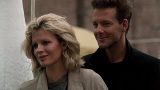 Mickey Rourke and Kim Basinger. "Nine 1/2 Weeks" (1985). Bryan Ferry - Slave To Love.