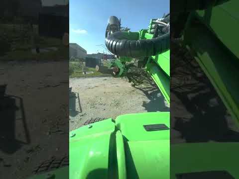 Avant loader doing tree work.