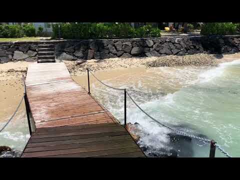 High tide on the Indian Ocean at The Tropical Attitude Trou D'eau Douce, Mauritius