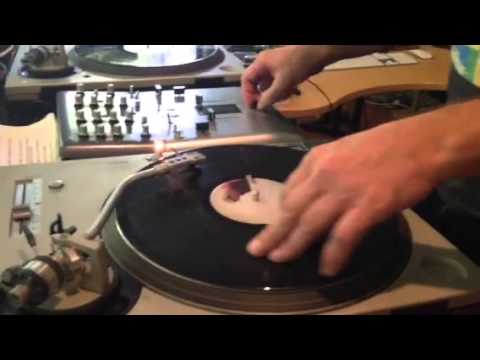 Joey Zuber scratch DJ'ing in the man cave -