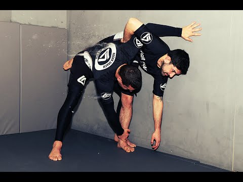 MMA Cage Wall Training - Hitting the Ankle Pick Takedown with Dean Barthelemy