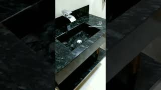 pia esculpida no granito