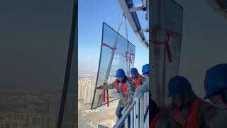 How Workers Install Massive Glass Panels on Skyscrapers in Extreme Conditions 🏗️💰 #shortvideo