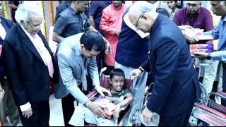 09.03.2024: Governor distributes Wheel Chairs to physically handicapped children at a programme organized by Shanta Siddhi Charitable Trust & AIIPMR;?>