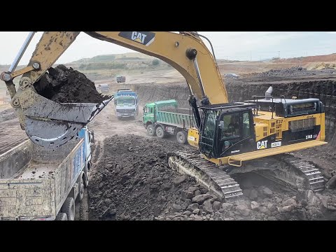 Caterpillar 374D Excavator Loading Mercedes And MAN Trucks - Interkat SA