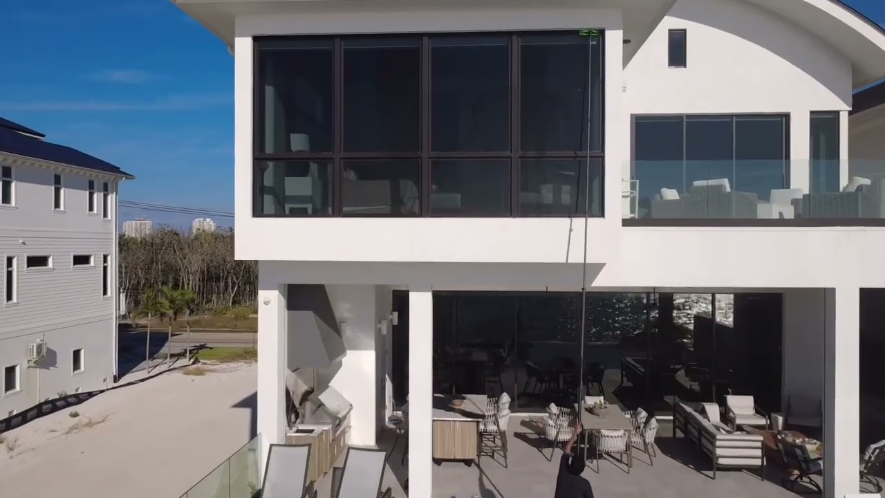 Aerial view of a waterfront home in Southwest Florida where Sparklean cleans interior and exterior windows