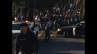 Raw: Skateboarder, Officer Hurt in Collision