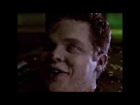 Trailer montage: Halloween decorations, fogged gym floor, moshy crowd—cut to a severed hand crawling