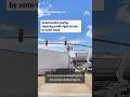Construction worker repairing traffic light struck by semi-truck