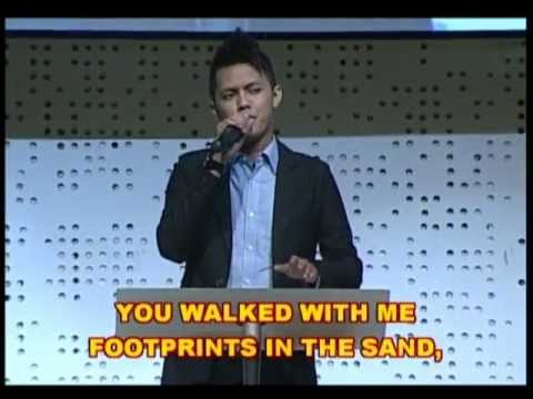Michael Panjaitan _ Footprints in the Sand
