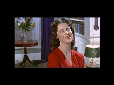 A scene from the film "DOCTOR IN LOVE" Virginia Maskell, Michael Craig. (1960). (HD)