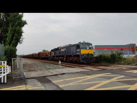 Irish Rail 071 Class Loco Number 078 hauling the Timber Wagons past Newrath Level Crossing..
