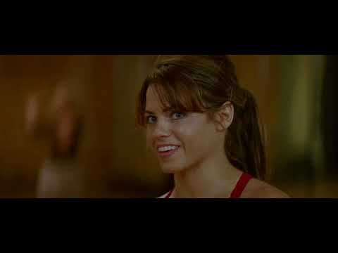 Trailer frame of the showcase finale with spotlight and crowd reaction