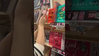 Putting my stickers in books at Dymocks #stickers #aestheticstickers #bookish #booktok #bookstickers