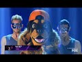 Masked singer Rottweiler preform alive by sia