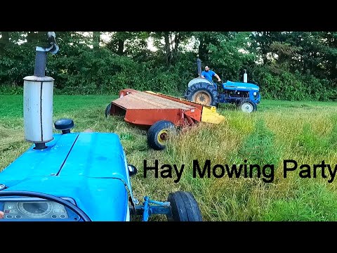 Two New Holland Haybines Going in Circles