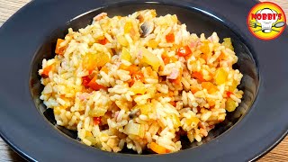 Pikantes Reisgericht mit Gemüse aus dem Reiskocher