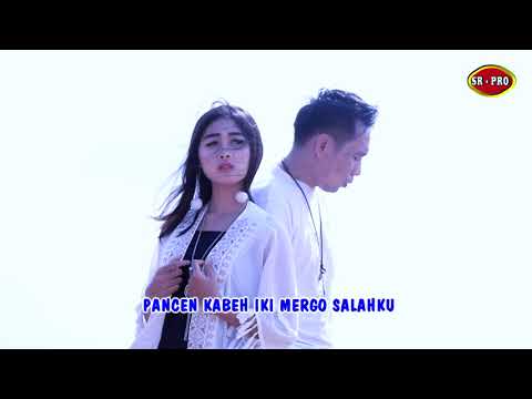 Yandi Baskara Feat. Tia Anggraini - Loro Tresno | Dangdut (Official Music Video)
