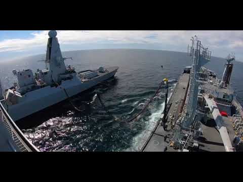 RFA Tideforce replenishes HMS Dragon