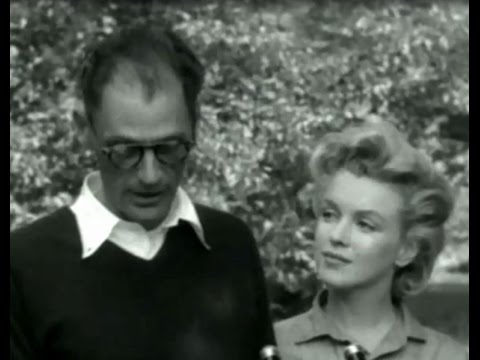 Footage of Marilyn Monroe and Arthur miller press conference before trip to England 1956