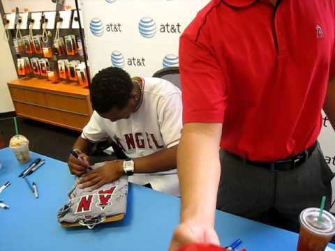 Erick Aybar signing autographs