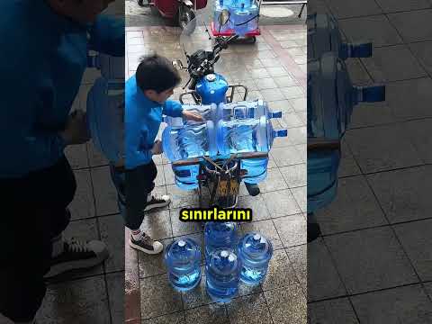 Fiziğin Sınırlarını Zorlayarak Motosikletine Damacana Yükleyen Sucu