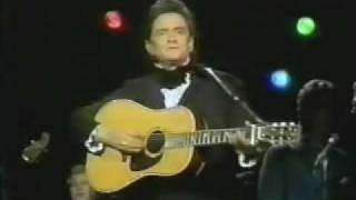 Johnny Cash sings "I'm Just Waitin' On June"