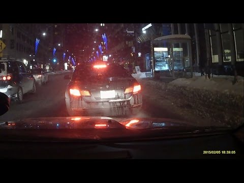 Dashcam View of Downtown Montreal in Winter at Night, Quebec, Canada