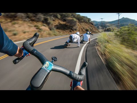 Longboarders vs Cyclist - Who's Faster?
