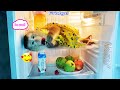 Super naughty and funny! It's hot, monkey Lyly lies in the refrigerator and eats fruit