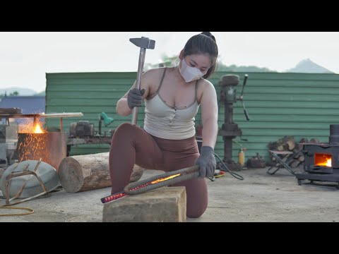 Beautiful blacksmith girl turns a rusty knife for a 100 year old woman into a sharp knife