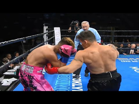 Oscar Escandon  stops Jhack Tepora in 1st-round