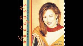MOMENT OF TRUTH BY SUZY BOGGUSS