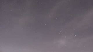 Orion rising in the night sky time lapse