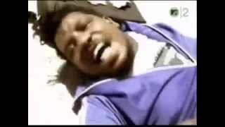 WESLEY WILLIS RUNS INTO A STOP SIGN