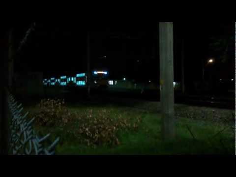 WARATAH SET PASSING INGLEBURN AT NIGHT