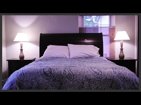 Part of a video titled How to assemble a wood bed frame - YouTube