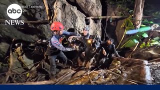 Download lagu Heavy rains threatening search efforts for 2 miners still missing in a cave in Laos mp3