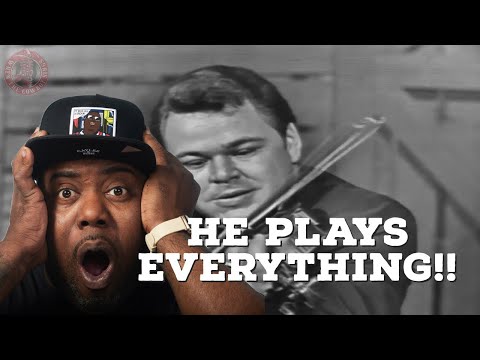 Roy Clark plays Guitar, Banjo and Fiddle Reaction
