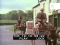 1960s Ireland Village Men Riding Horse Drawn Carts 35mm Archive Footage