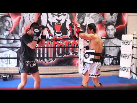 Joe "Killa" Concha hitting the pads