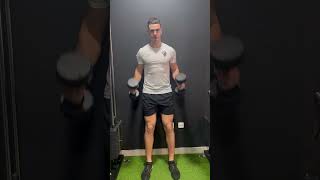 CURL MARTILLO CON MANCUERNAS (PARED)