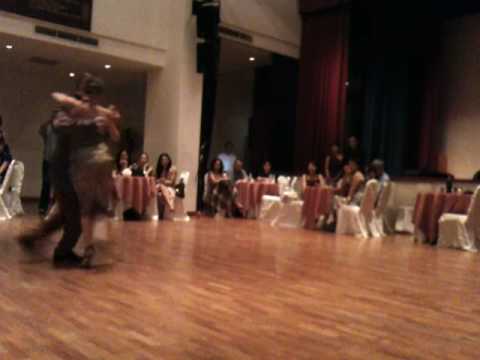  Andrea Misse  and  Javier Rodriguez  are  dancing  to  the  milonga  "  Milonga, Vieja Milonga  "